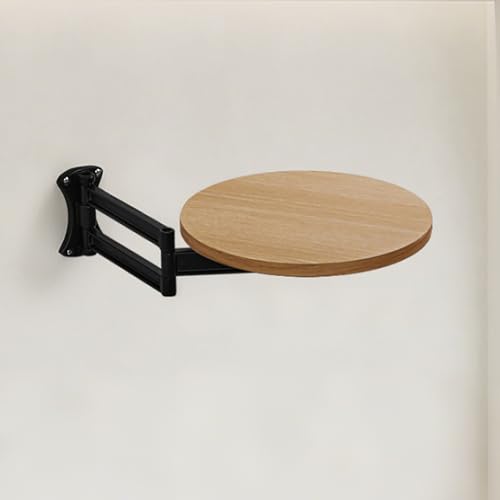 Table pliante murale noire idéale comme bureau rabattable dans un studio étudiant