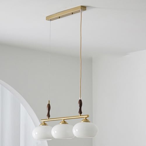 Lampe suspendue vintage orange pour éviter l'éblouissement à table