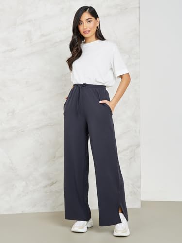 Image of Styli Women Track Pants | Mid-Rise Cotton Joggers & Flared Styles | Loose-Fit Comfort for Lounge, Travel Soft Fabric & Easy Wash