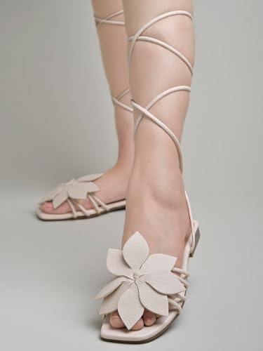 Image of Shoetopia Elegant Flat Sandals with Floral Detail | Chic Lace-Up Straps | Comfortable Summer Footwear for Women