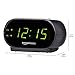 Amazon Basics Small Digital Oval Alarm Clock With LED Display, Nightlight & Battery Backup, Black, 4.5 x 3.5 x 2.4 Inches