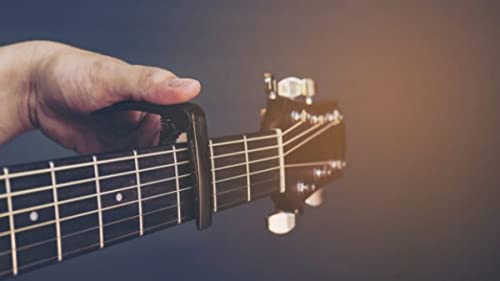 Ducomi Capodastre guitare acoustique + 1 médiator – Capodastre professionnel pour cordes guitare classique, ukulélé… - Les Beatles, Paul McCartney, John Lennon, RIngo Starr, George Harrison Ducomi Capodastre guitare acoustique + 1 médiator - Capodastre professionnel pour cordes guitare classique, ukulélé… – Image 5