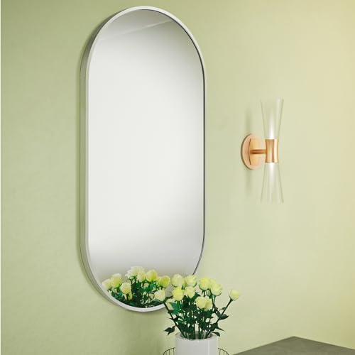 DETTAGLI: 1x specchio ovale con cornice argentata / dimensioni: 75 x 38 x 3 cm / peso: 3 kg / materiali: vetro, MDF e lega di alluminio antiruggine.
