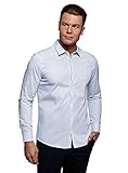 Impresionante camisa clásica con estampado de rayas pequeñas. Ideal para crear un sobrio look de negocios. Perfecta para la oficina y los encuentros formales así como una cita en un restaurante