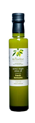 Aceite de oliva extra virgen con limones frescos miniatura 1