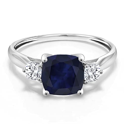 Gem Stone King 10K White Gold Blue Sapphire and White Moissanite 3-Stone Engagement Ring | 2.26 Cttw | Cushion 7MM | 3 Stone Wedding Anniversary Promise Gold Ring For Women