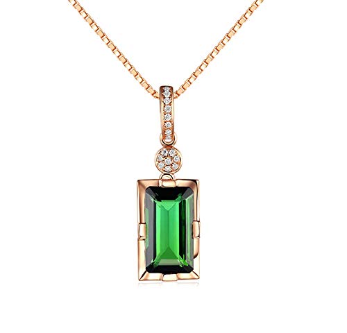 Bijou géométrique émeraude pour sublimer vos mains avec élégance