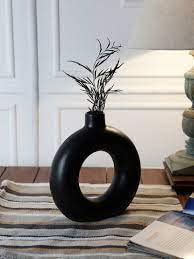 See full amazon price history chart for Ceramic Decorative Vases for Home Decor, Center Table, Flowers Pot, Bedroom Side Corners, Living Room Decoration and Party Centerpieces | Planter | Flower Pot | Ring Shape Planter (Black) Ceramic Decorative Vases for Home Decor, Center Table, Flowers Pot, Bedroom Side Corners, Living Room Decoration and Party Centerpieces | Planter | Flower Pot | Ring Shape Planter (Black) (B09Y24BR2J) Amazon Price History, Amazon Price Tracker