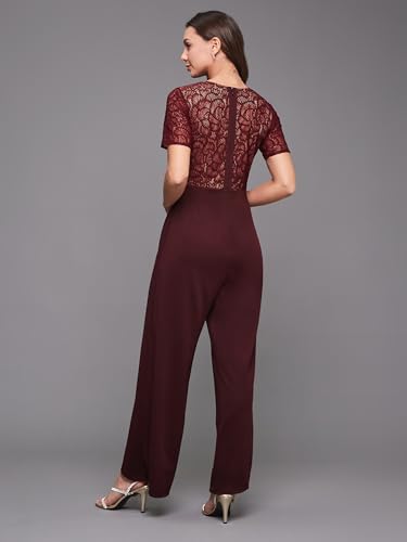 Image of Miss Chase Women's Halter Neck Sleeveless Solid Wide Leg Sequin Paneled Regular Length Jumpsuit