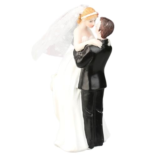 Figura de novios abrazándose para evitar caídas en tartas de boda delicadas 3