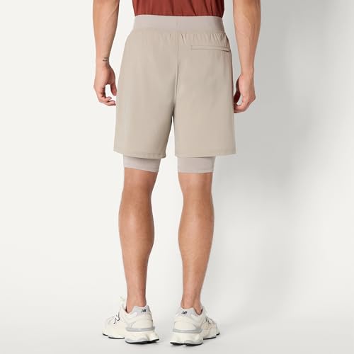 Image of Amazon Essentials Men's Athletic Running Training Shorts, Performance Stretch Woven Workout Shorts, 7 inch