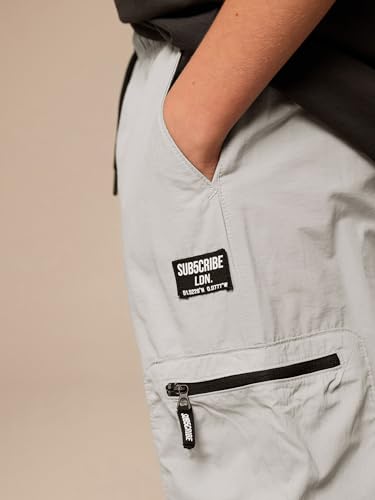 Pantalones cargo para niños con bolsillos con cremallera cómodos de NEXT en color verde militar 6