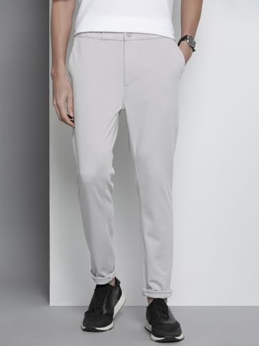 Image of The Indian Garage Co Men Slim Fit Solid Mid-Rise Stretchable Knitted Jogger Trousers