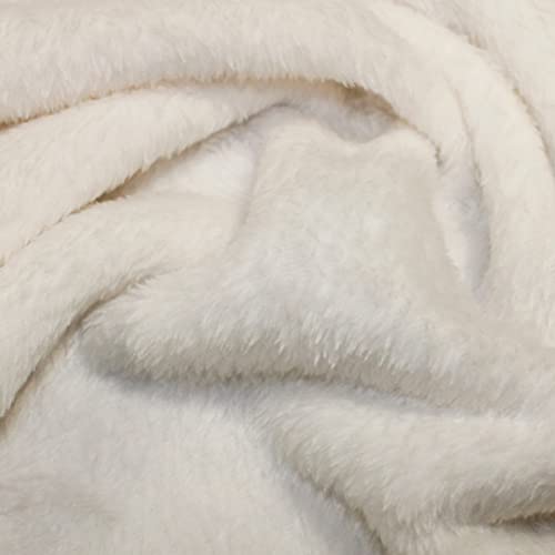 Tissu polaire corail pour coudre un plaid de canapé cocooning au salon