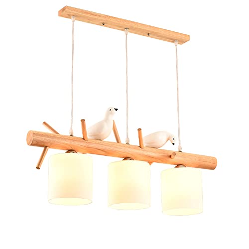 Lustre oiseau en bois pour illuminer une salle à manger sombre et vide