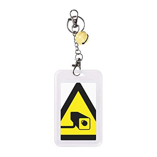 Badge triangle pour appareil photo jaune et noir avec symbole avertissement cloche