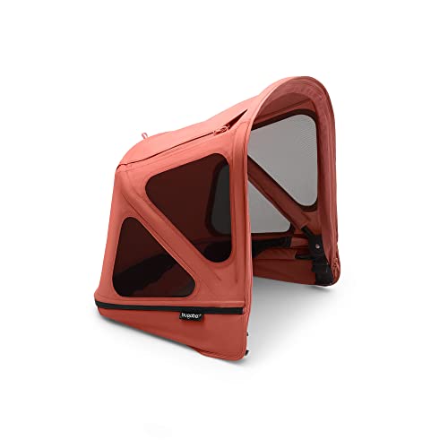 La cappottina breezy Bugaboo Donkey, parte degli accessori estivi irrinunciabili, è caratterizzata da un tessuto UPF 50+ che assicura un'elevata protezione solare e fornisce ombra al tuo bambino durante le calde giornate estive