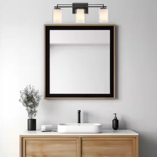 Image of TRANS GLOBE 22483 BK I Lisbon Collection 24 Inch Three-Light Bathroom Vanity - in a Black Finish | Metal Housing I Clear & Frosted Shades I Modern Contemporary Light Fixture |