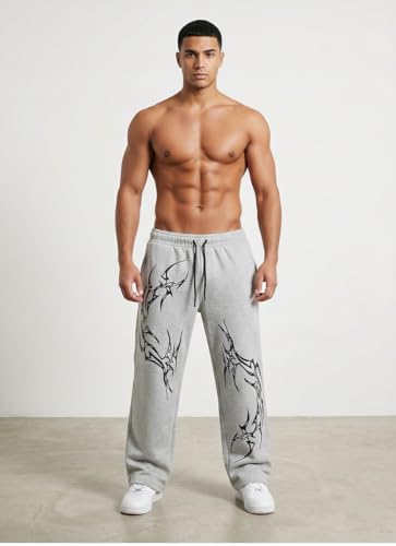 Image of Aesthetic Gothic Wide Leg Pants for Men | Tribal Print Baggy Streetwear | Oversized Track Pants with Elastic Waist | Black and White Relaxed Fit Bottoms