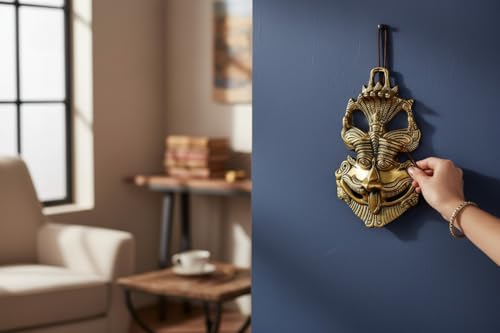 Image of Kridaykraft Metal Feng Shui Vastu Showpiece Nazar Battu with Naag Ganesha Suraksha Kawach Mask for Evil Eye Protection for Home, Office Wall & Door Hanging (Gold, Medium) - 9.5 Cm