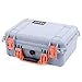 Silver Pelican 1450 case with orange handle & latches. With foam.