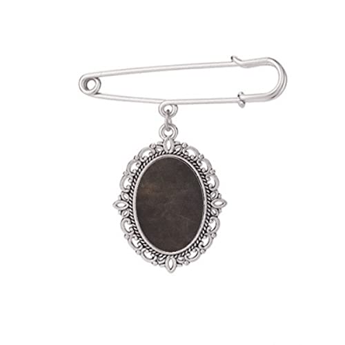 Broche en cuir noir M, un bijou de haute maroquinerie pour robe