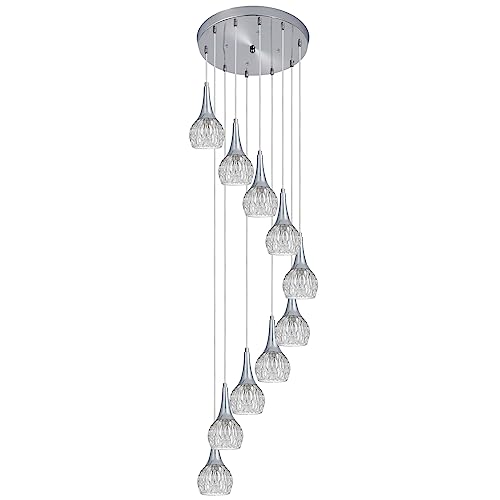 Lustre en spirale contre l'obscurité des hauts plafonds et grands foyers