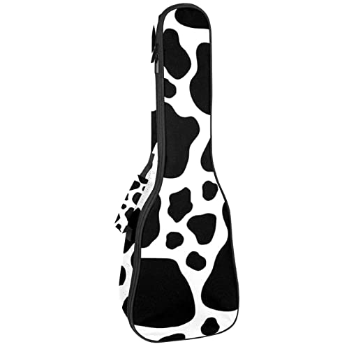 Texture vache noire et blanche pour ce sac à dos de ukulélé au design unique et rembourré