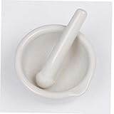 mortier agréable avec un bec verseur qui sert également à maintenir le pilon de coordination en place.