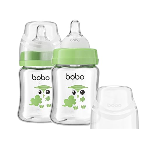 Image of YOHKOH Glass Baby Bottles with Slow Flow Nipple, Newborn Anti-Colic Baby Bottles for 0+ Months, Wide Neck Feeding Bottle, Clear (Green, 5oz (Pack of 2))