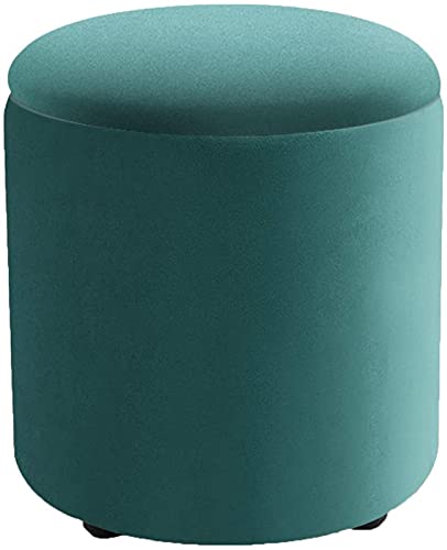 Pouf de rangement rond vert pour optimiser une petite entrée encombrée
