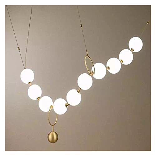 Suspension design en verre pour illuminer votre salle à manger