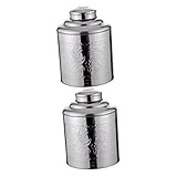 Boîte à thé pour thé en vrac - un design créatif fait briller une personne en ce moment, caresser avec admiration.