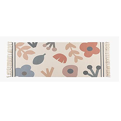Tapis en coton tissé main style vintage chic avec pompons