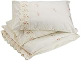 parure de drap brodee Une housse de couette king size (230 x 220 cm) et deux taies d'oreiller (50 x 75 cm).