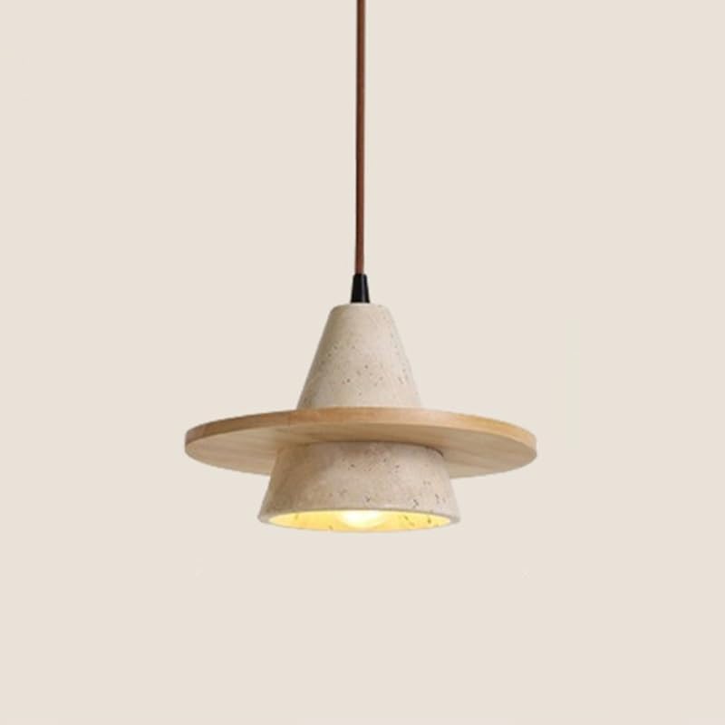 Îlot de cuisine illuminé par la suspension en marbre et travertin design