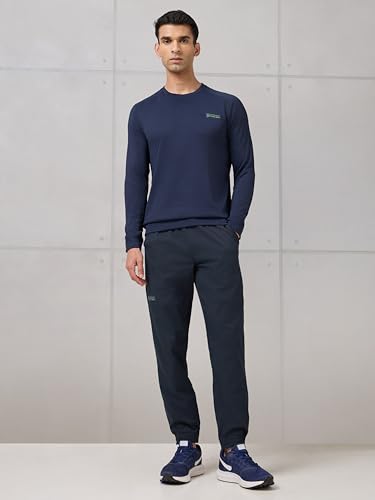Image of TECHNOSPORT Men's Regular Fit Joggers with Zip Pockets, TS Flexi Quick Dry Stretchable Lightweight Track Pants for Gym Running and Casual Wear