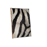 Zebra Print Wall Art framed photograph for modern bedroom decor, black and white animal pattern with natural wood frame, ready to hang or lean