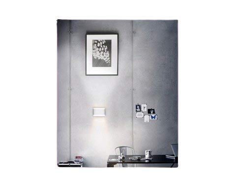 Philips 34153 7W Wall Light illuminating a wall above a desk