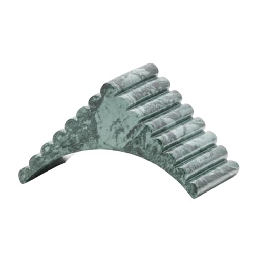 Statue géométrique pour combler le vide d'une table basse de salon