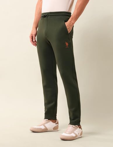 Image of U.S. Polo Assn. Men's Green Solid Mid Rise Cotton Drawstring Slim Fit Flat Front Slit Pocket Track Pants