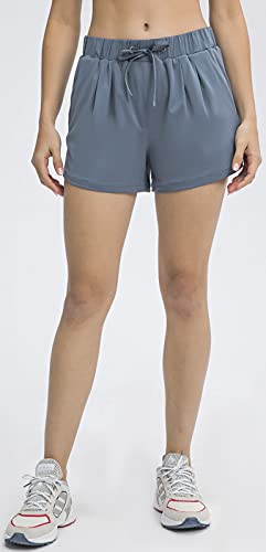 Image of Ukaste Women's Stretch Workout Running Athletic Shorts with Pockets - 3 Inch
