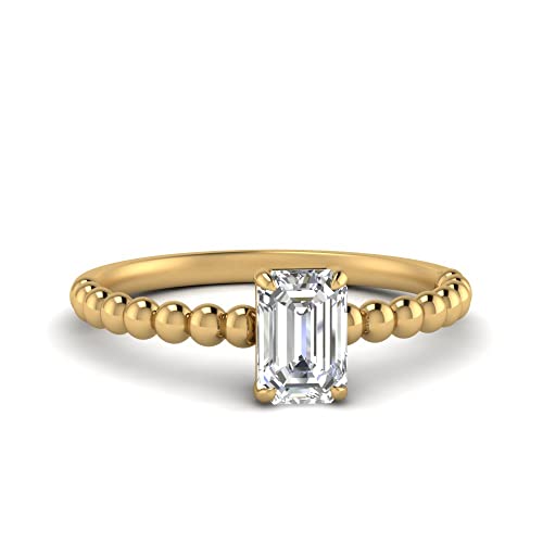 Bague émeraude et perle de haute joaillerie en plaqué or jaune pour des fiançailles