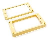 PROFESSIONAL QUALITY - Plastic flat bottom tapered humbucker pickup rings (2) in Cream finish COMPLETE SET - Includes both Neck and Bridge position rings TRADITIONAL FIT - A great replacement compatible with Gibson USA Les Paul and SG guitars. (*It i...