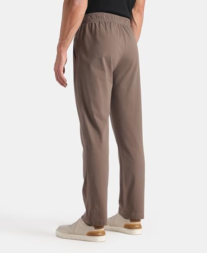 Image of Jockey AM49 Men's Super Combed Cotton Rich Slim Fit Trackpants with Side Pockets and Zipper Media Pocket