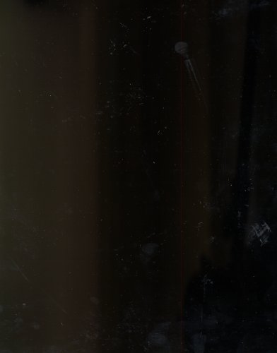 F/A-18 Super Hornet flying over water, leaving white contrails