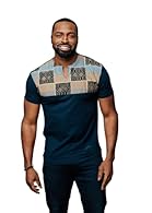 VIBRANT AFRICAN PRINT: Infuse your wardrobe with the rich cultural heritage of African design with our Dayo Men's African Print T-Shirt, featuring a striking blue/tan/navy colorway that adds a pop of color and style to your ensemble. YEAR-ROUND VERSA...