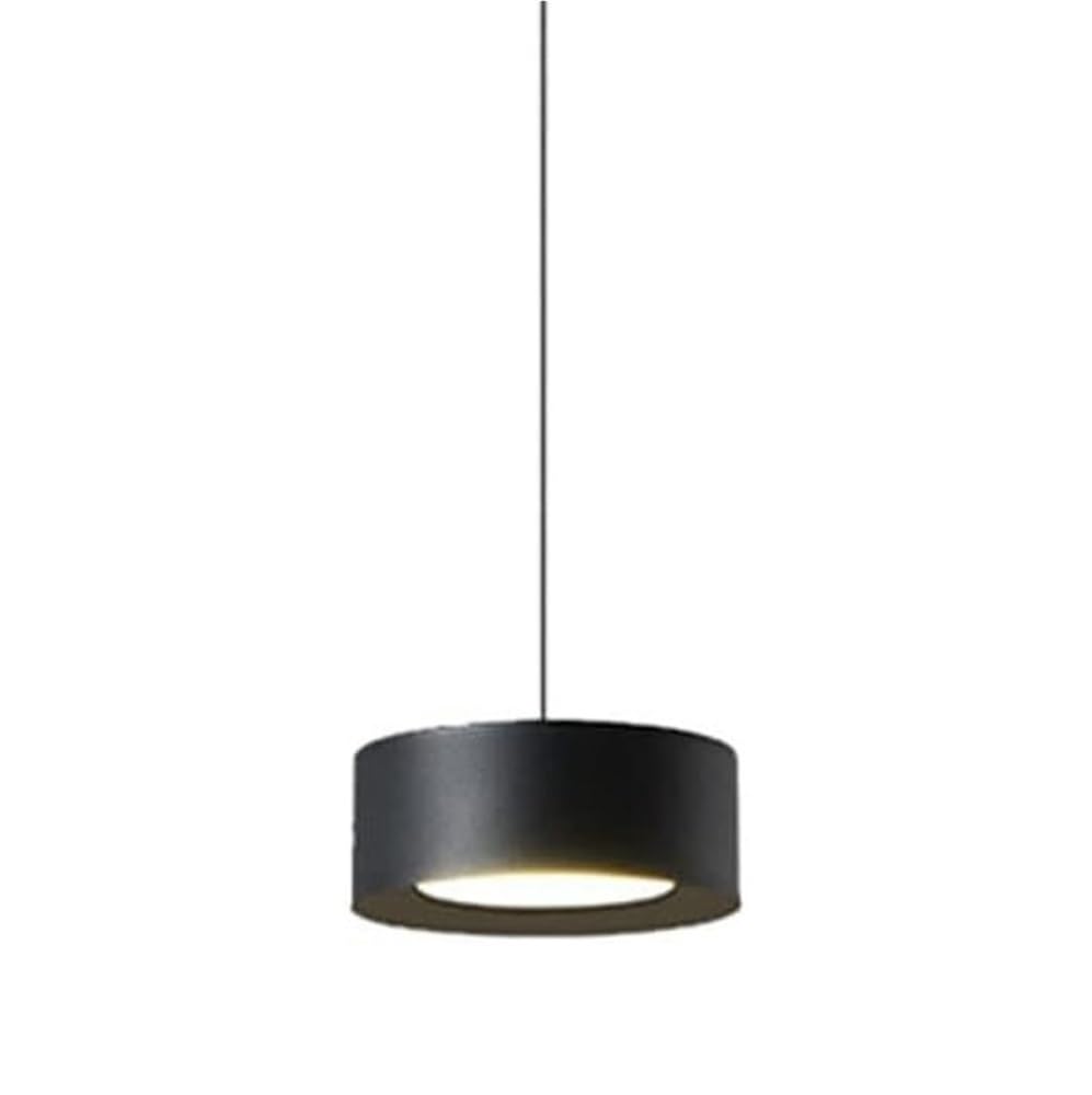 Lampe LED dimmable noire pour une ambiance de chambre feutrée et un chevet design et épuré