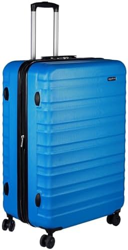 Amazon Basics Hartschalen-Koffer Groß, Erweiterbares ABS-Reisegepäck, 4 Doppel-Spinnerräder, Kratzfest, 78cm x 52,6cm x 32cm, 105l, 5,4kg, Hellblau, für Längere Reisen und Familien