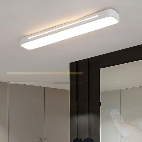 Lampe de plafond longue blanche éliminant les zones d'ombre dans les couloirs